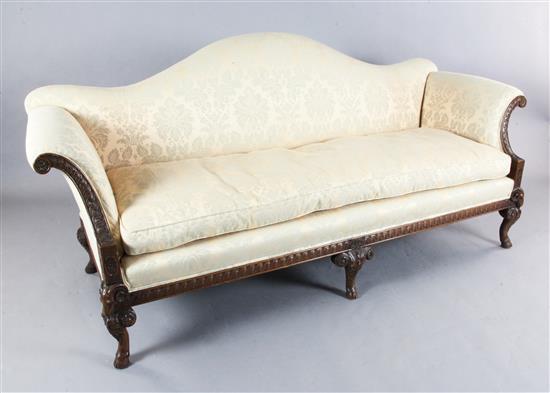A Georgian style walnut three-seat settee, W.6ft 10in. D.2ft 8in. H.3ft